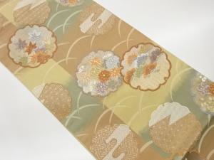 雪輪に草花・古典柄模様織出し袋帯